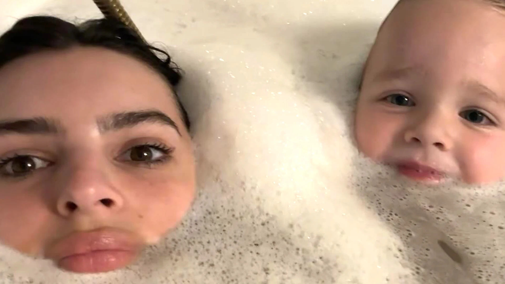 Emily Ratajkowski takes a bath with her son Sly, 3, after date night with Shaboozey