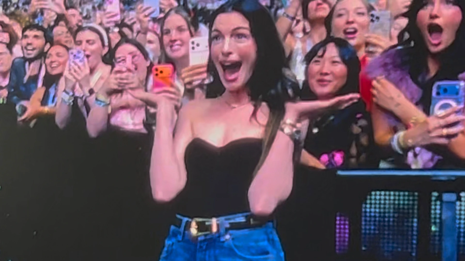 Anne Hathaway ‘arrested’ by Sabrina Carpenter with fuzzy pink handcuffs during steamy performance in NYC