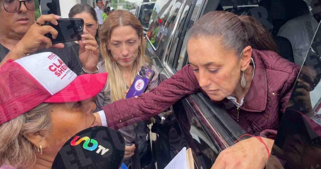 VIDEO: Sheinbaum arriba al puerto a revisar emergencia; comerciantes le exigen apoyos