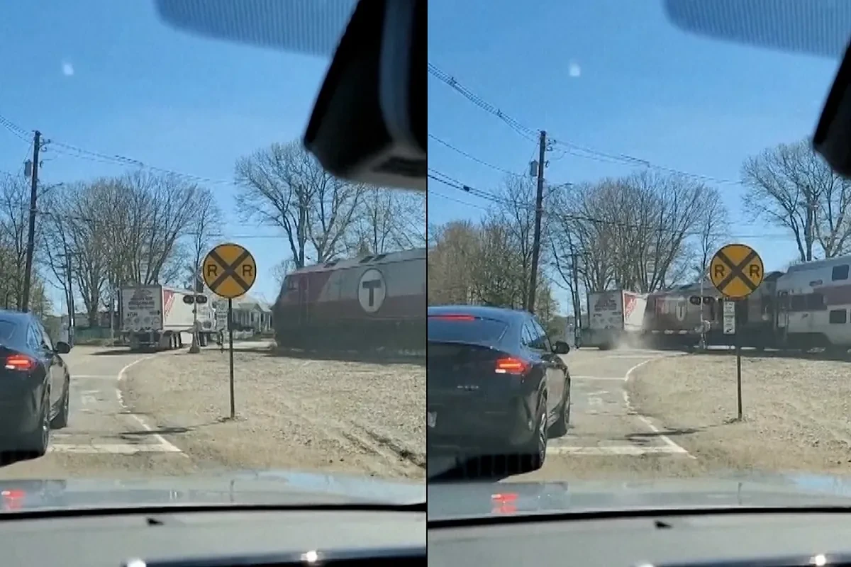 El momento en que un tren se lleva por delante un camión arrollándolo