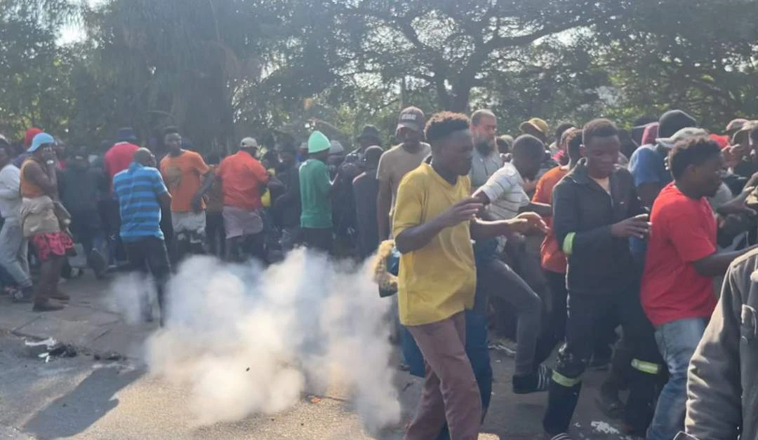 Teargas and tensions spike as stranded Malawians clash with cops in Durban