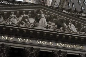 Stocks notch modest gains and a 3rd winning week for S&P 500