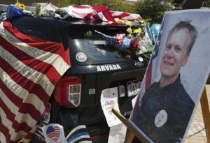 ‘Hero’ who shot Colorado gunman was killed by officer, police say