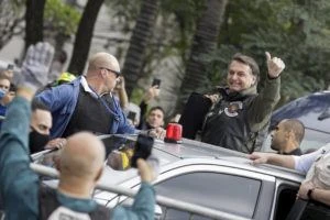 Brazil President Jair Bolsonaro fined as he flouts mask rule before motorcyclists