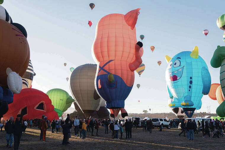 Fans join the fun by volunteering at balloon festivals across the U.S.