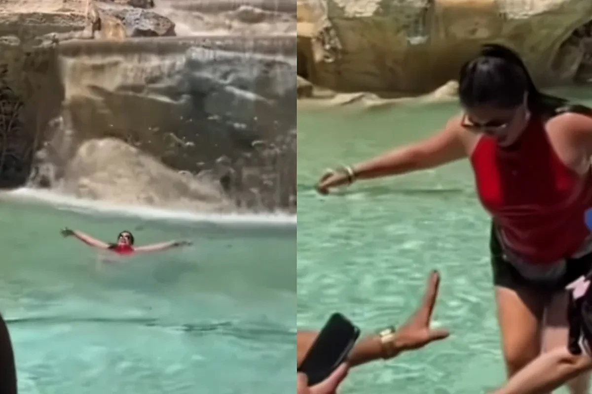 Una turista se lanza a la Fontana di Trevi en Roma para refrescarse por la ola de calor
