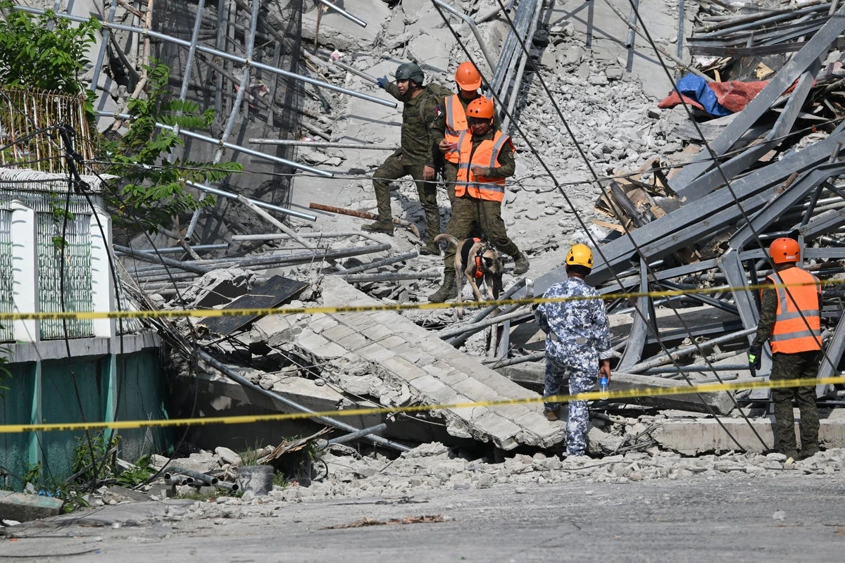 At least 3 dead and 17 missing after hotel collapses in Philippines