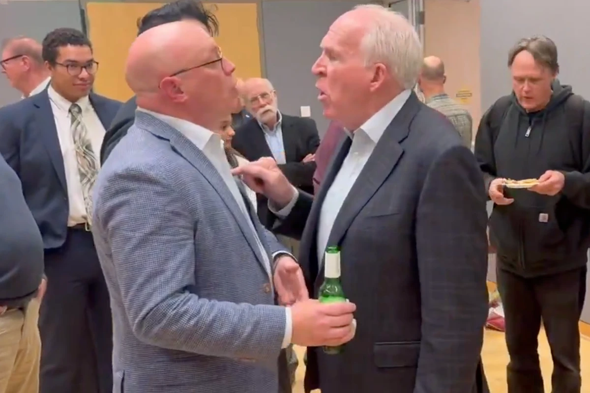 John Brennan pokes activist in chest over Hunter Biden laptop claim