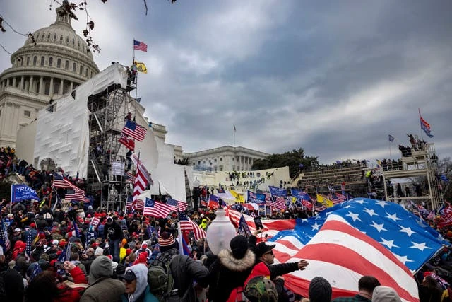 Shocking new video shows Capitol rioter charging police with flagpole