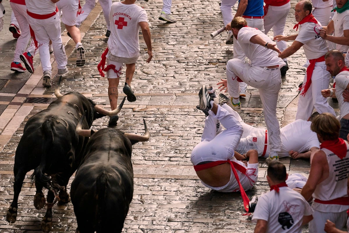 One man gored and others bruised in Spain’s bull running festival