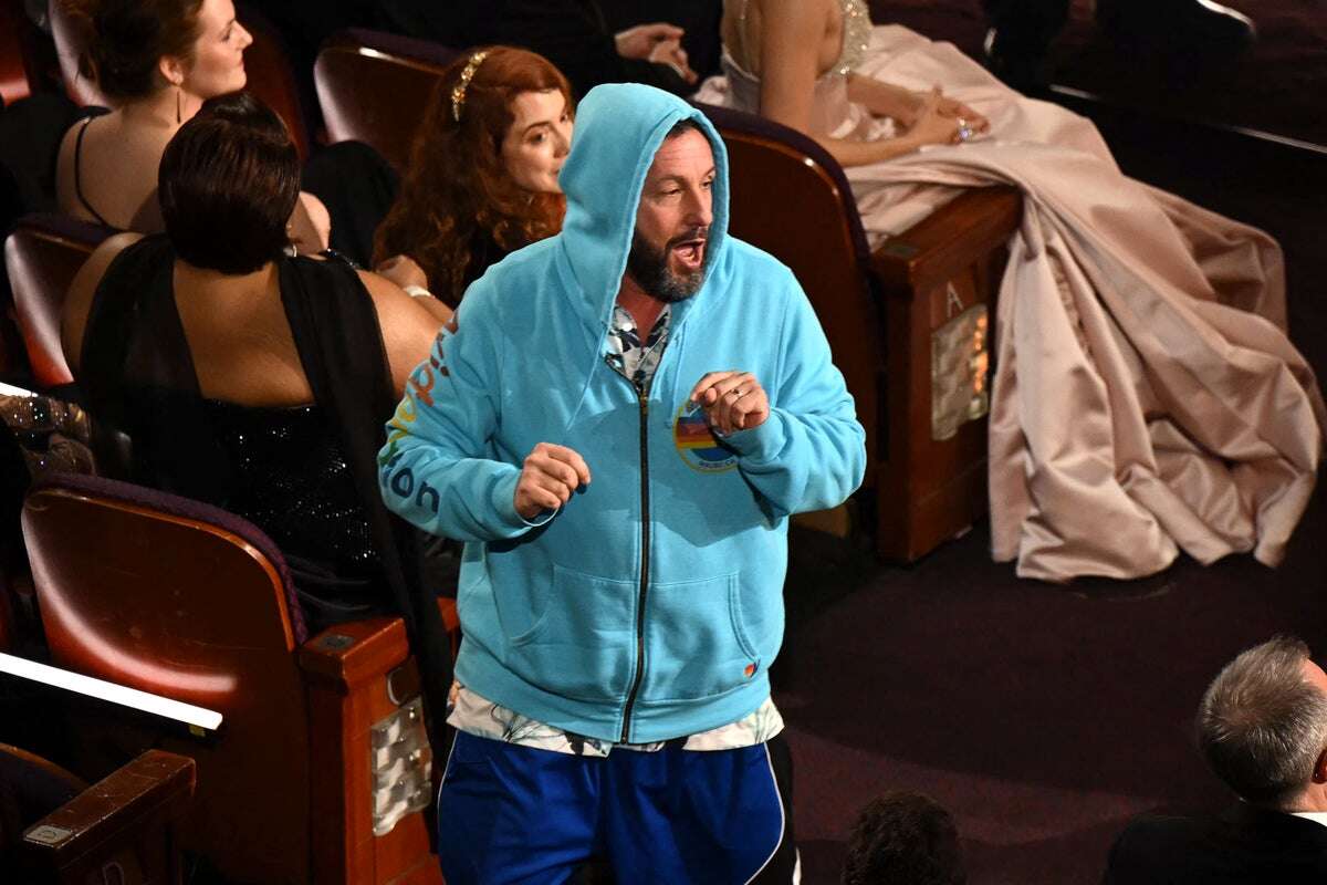 Adam Sandler exits Oscars early after jokes about his casual attire