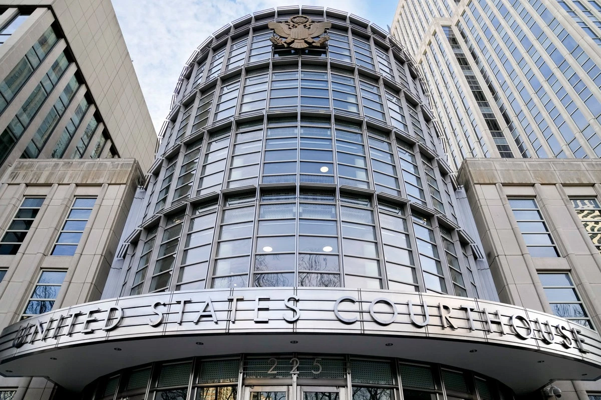 Scholar spared prison in US case alleging China spies on dissidents abroad