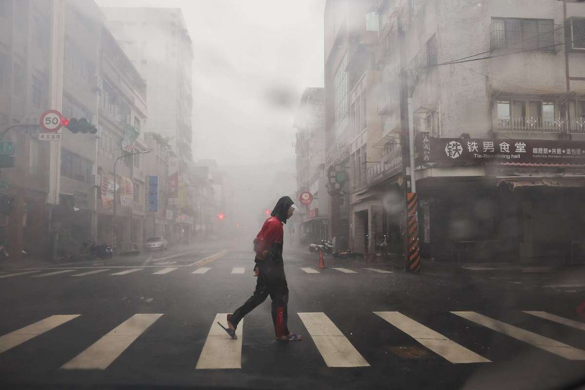 Millions told to seek shelter as storm nears landfall in Taiwan - live