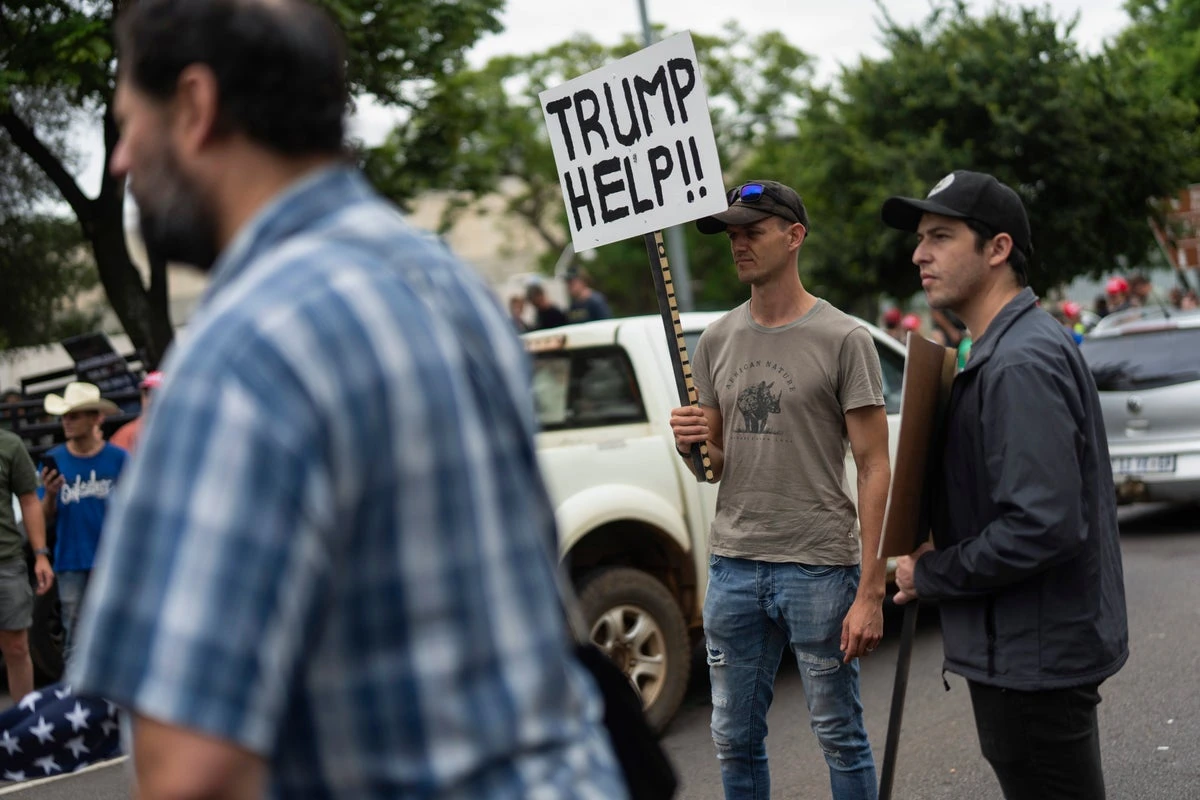 First group of white South Africans leave for US after Trump offer
