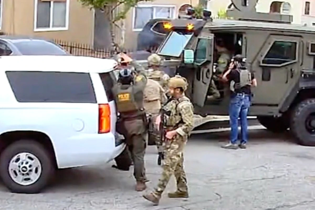 Heavily armed federal agents blow door off suspect’s home