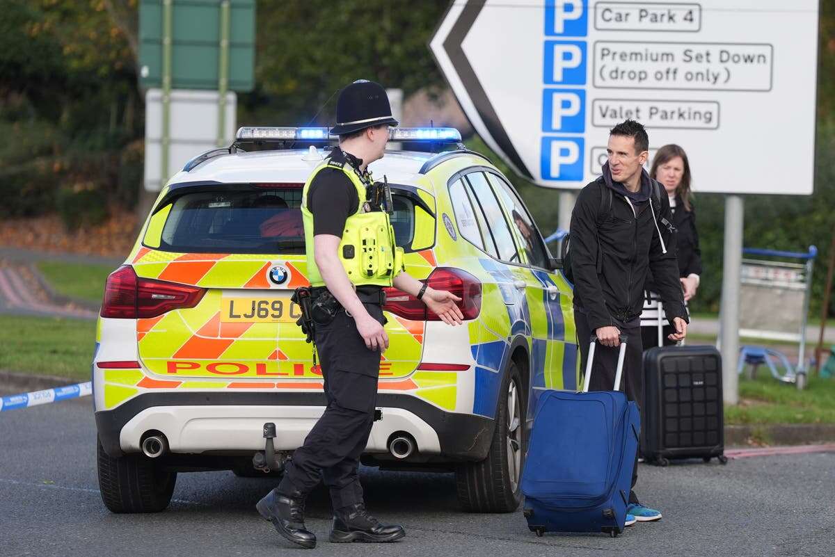 Flights delayed after bomb scare forces hundreds to evacuate - live