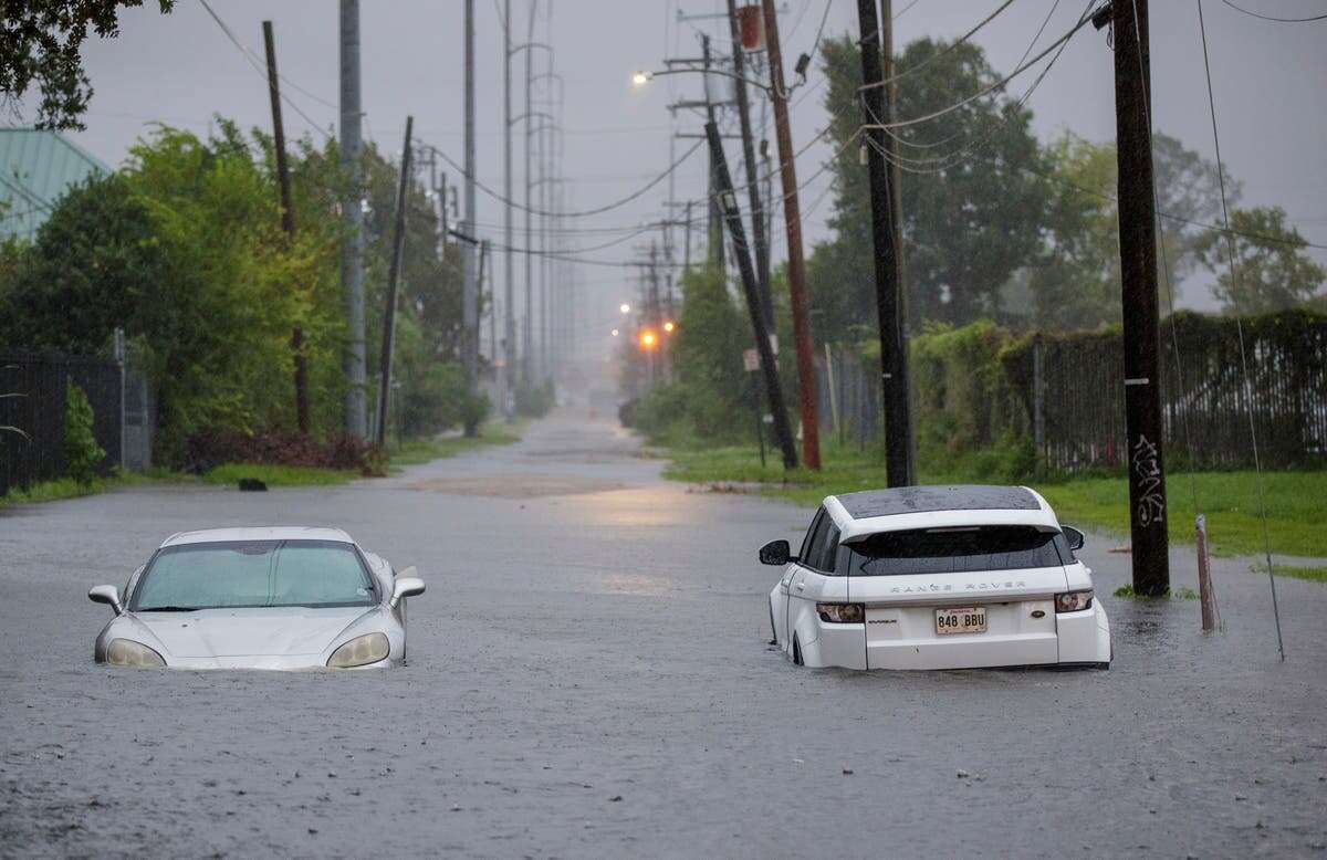 Nurse says it was ‘second nature’ to rescue man trapped in floodwaters