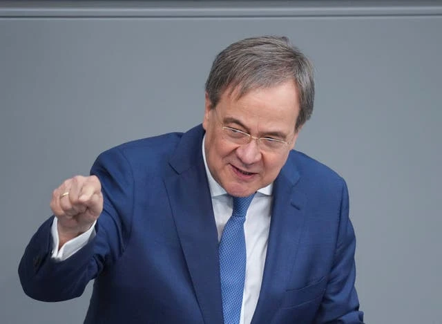 Candidates to succeed Merkel defend EU, blast nationalism