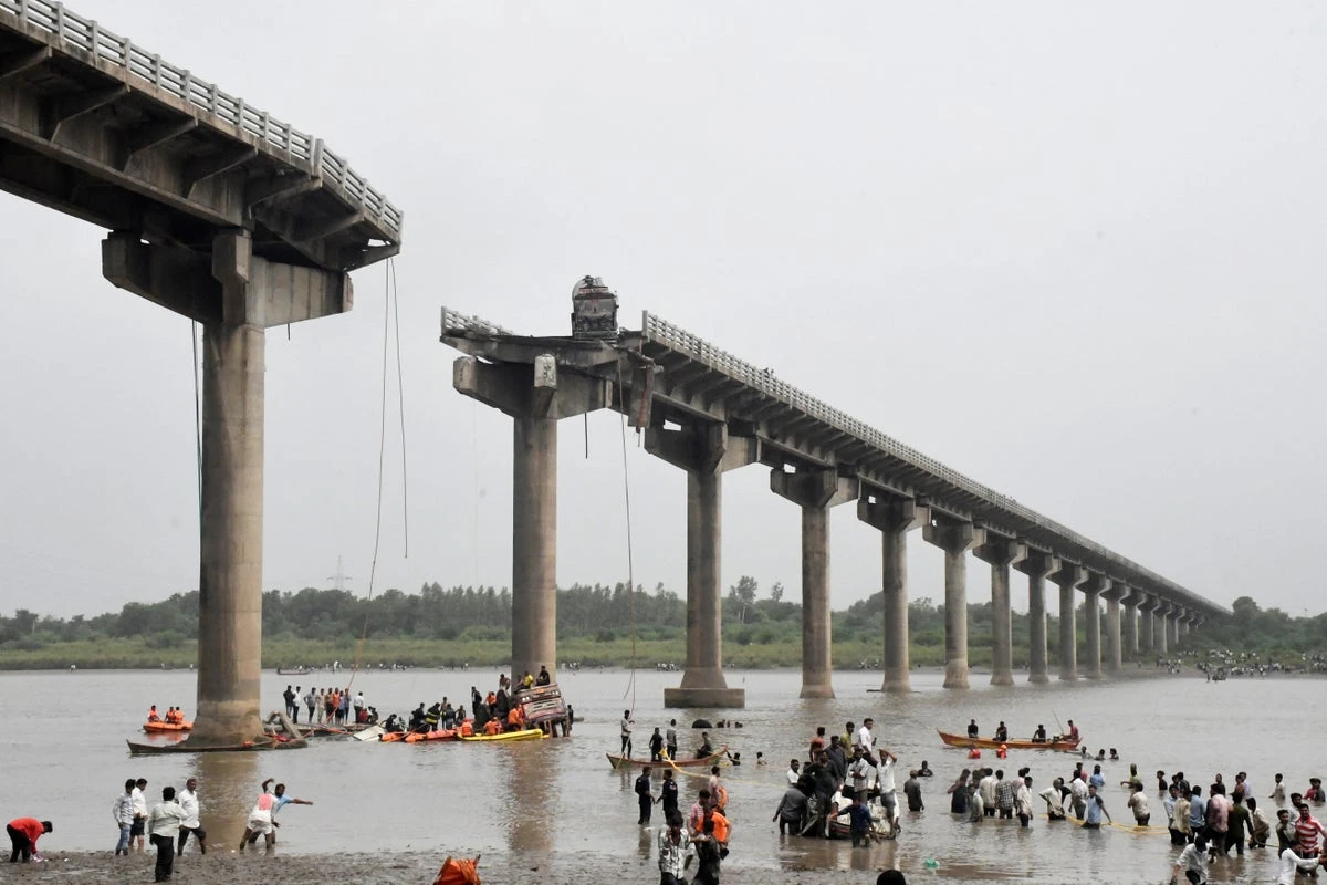Cars plunge into river killing 9 people as bridge collapses in India