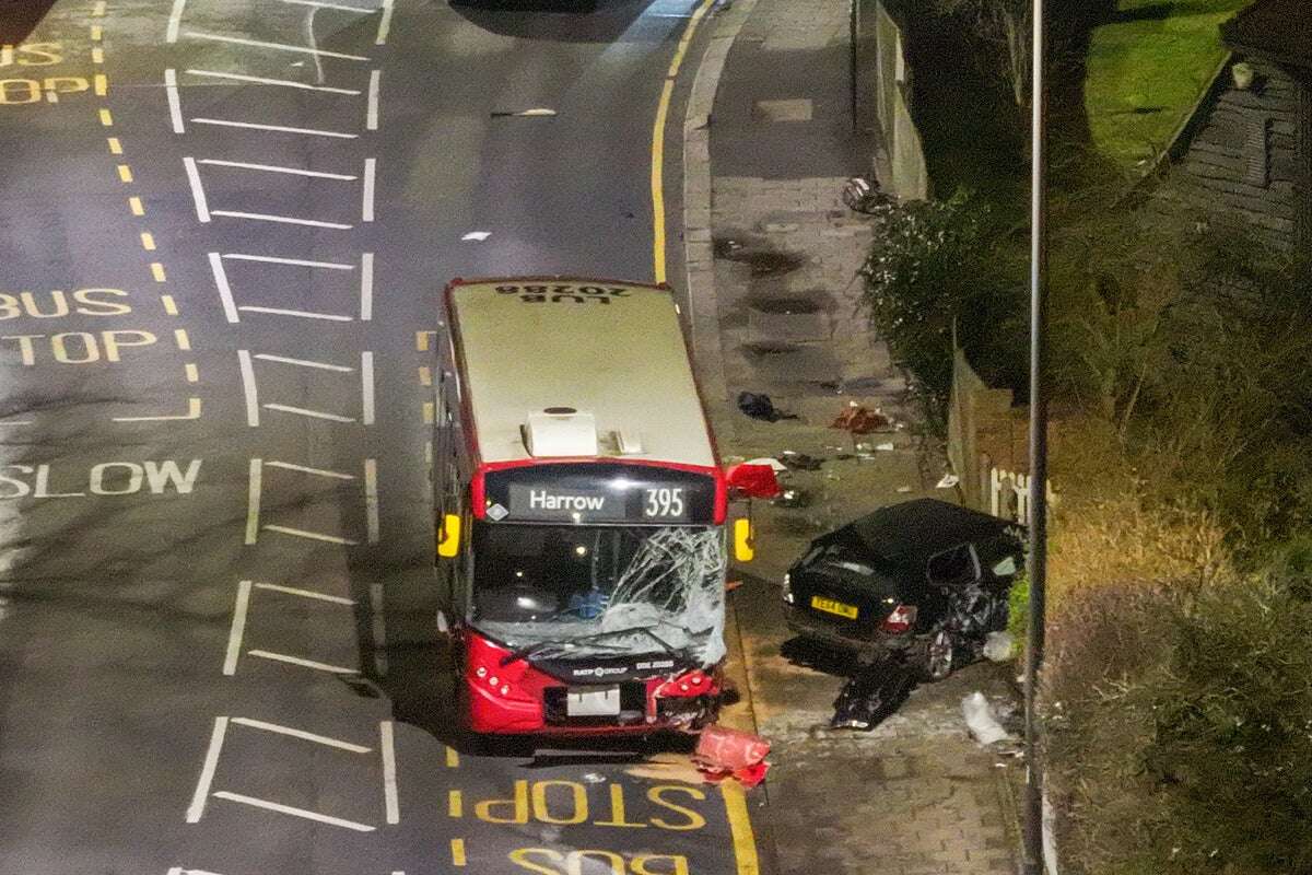 Woman killed and two injured after crash between London bus and car