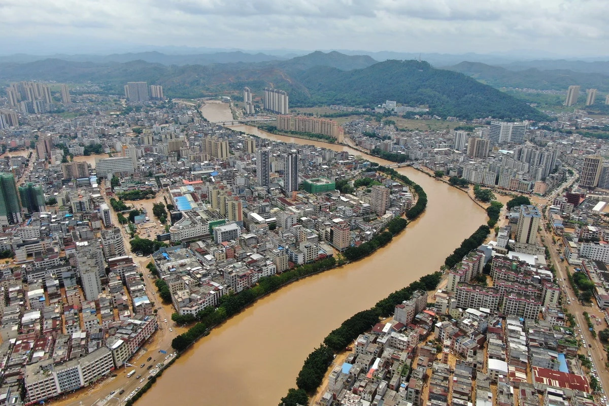 China on high alert for floods as record rain triggers landslides