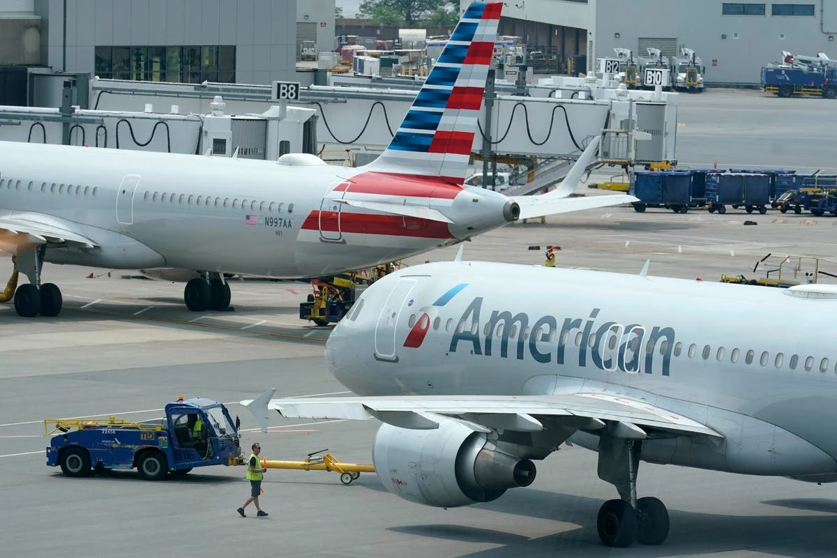 American Airlines plane catches fire at Denver airport