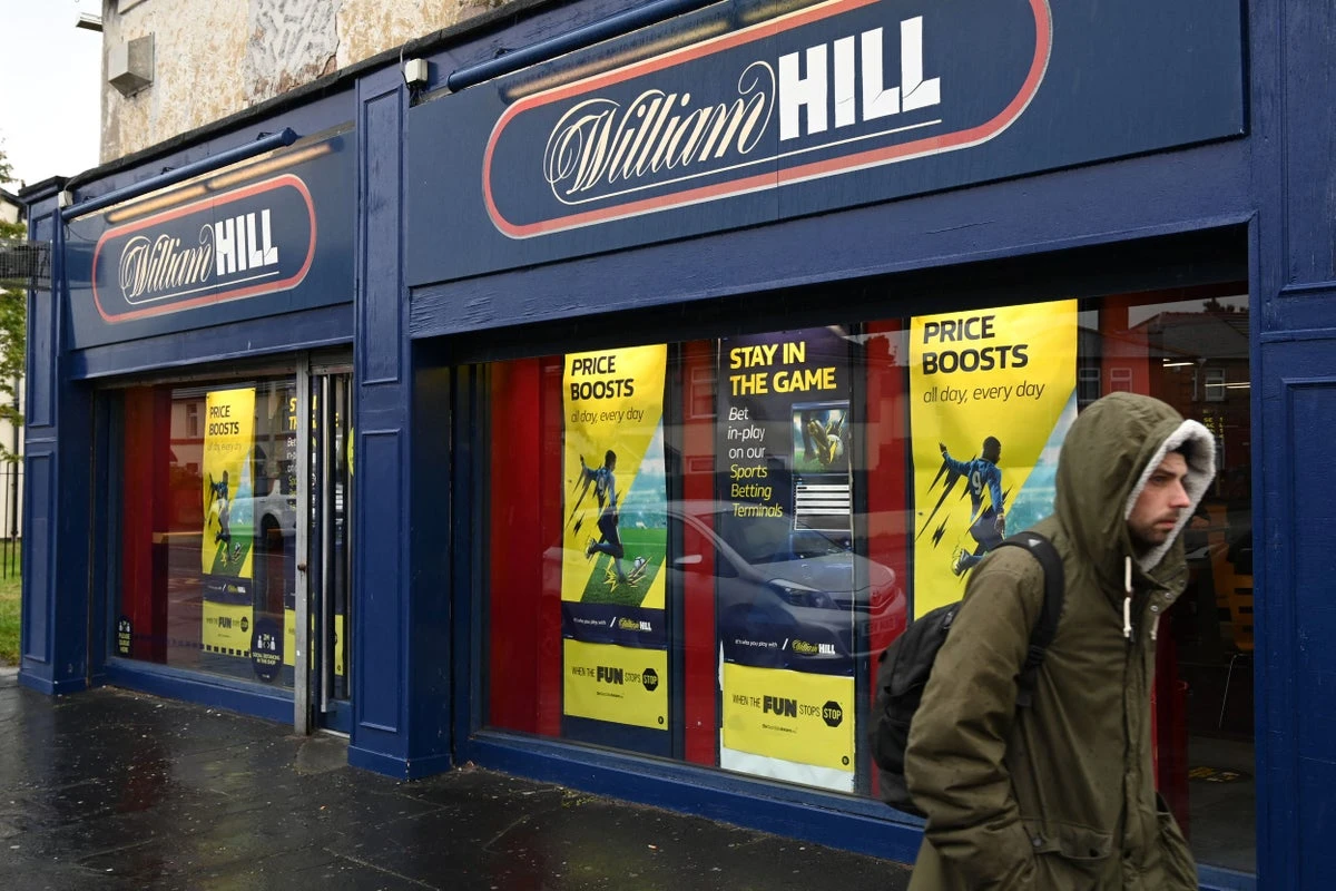 William Hill owner to close hundreds of shops despite takeover talks