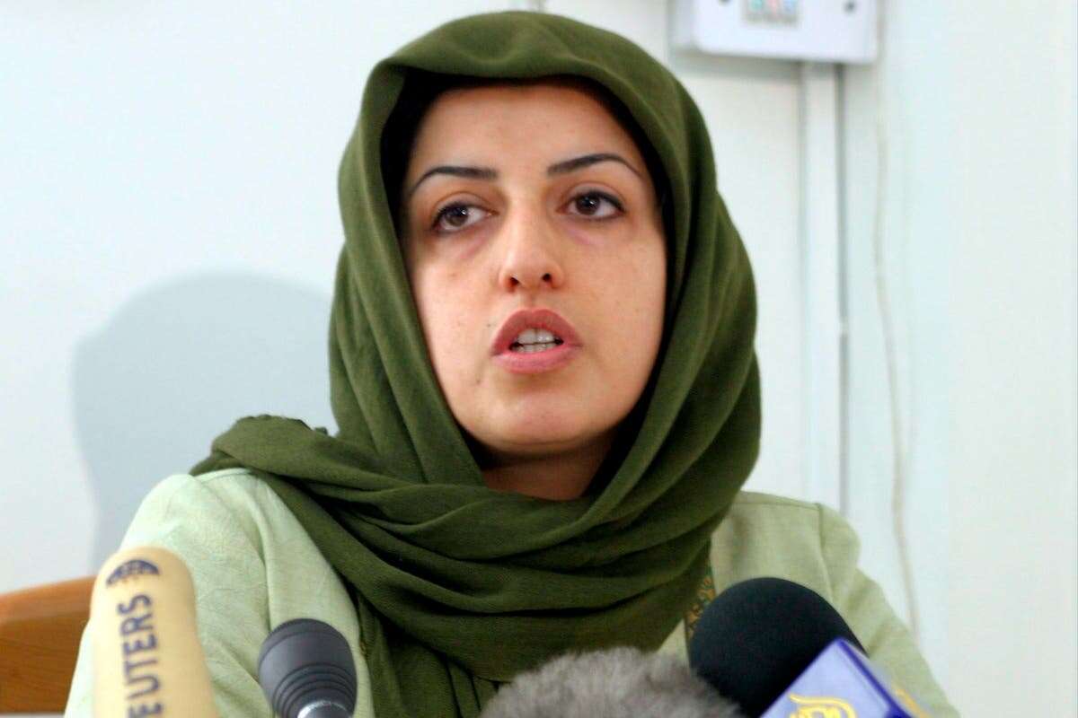 Children of jailed Iranian activist accept her Nobel Peace Prize