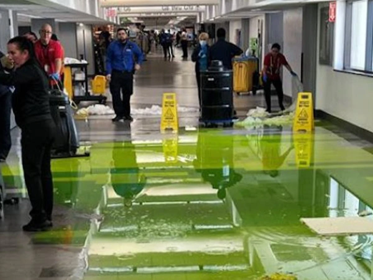 Bright green liquid gushes from ceiling at Miami International Airport