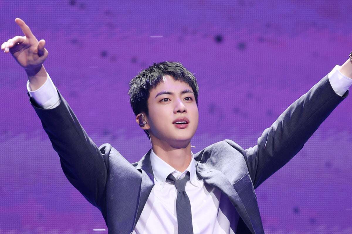 Japanese woman booked over kissing BTS member Jin at fan event