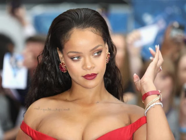 Rihanna covers up matching shark tattoo she got with Drake