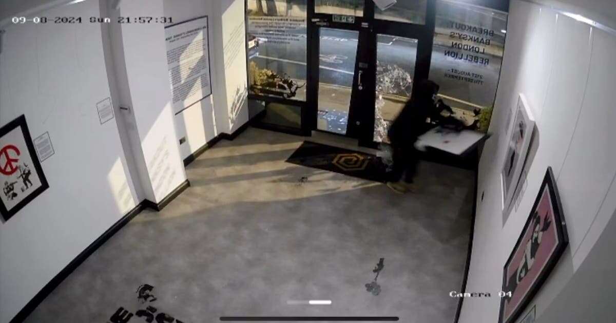 Shocking moment thief breaks into London gallery and steals Banksy art