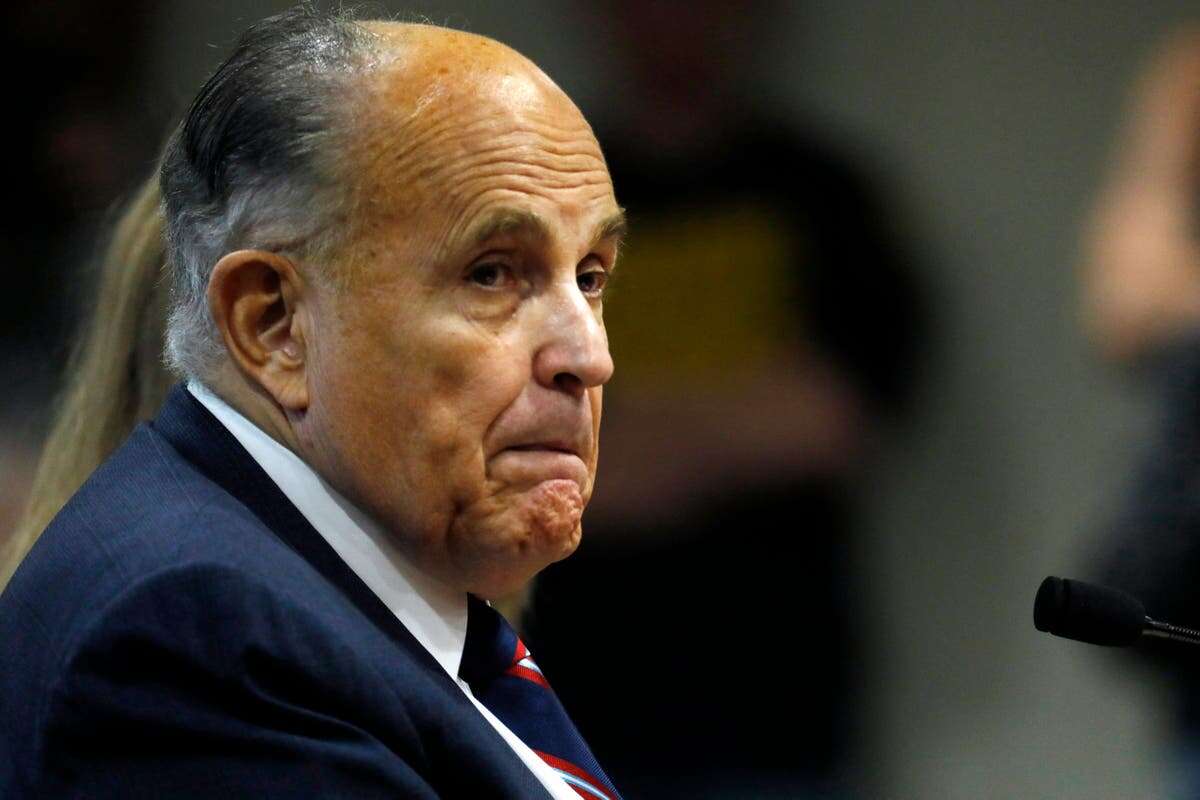 Giuliani settles with defamed election workers after blowing off trial