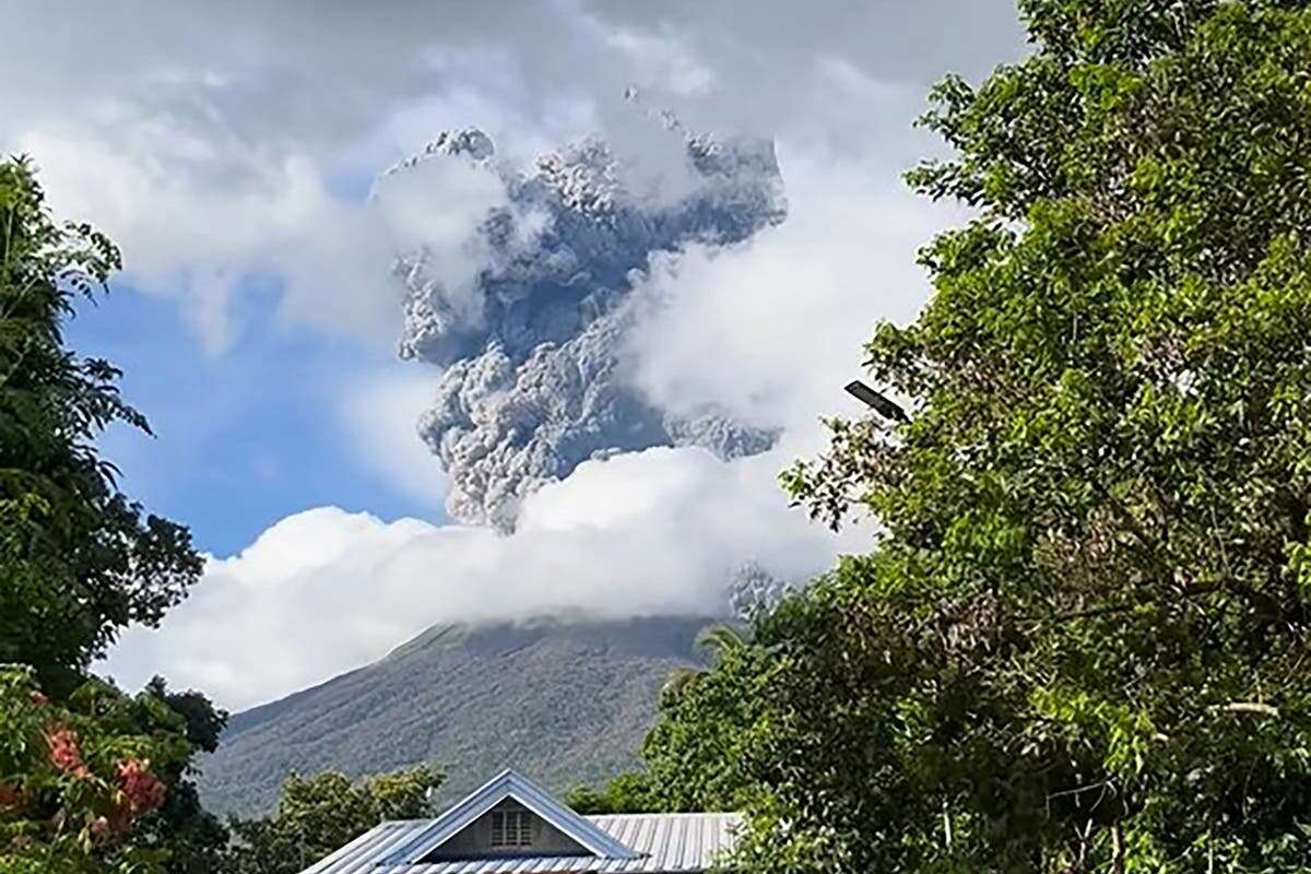 Philippines volcano sends huge ash column into sky