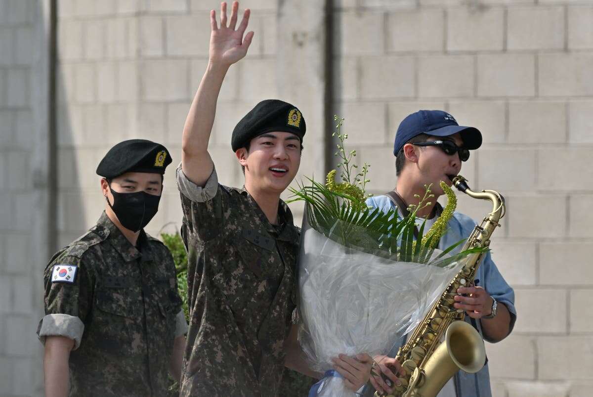 BTS members welcome back Jin after discharge from military service