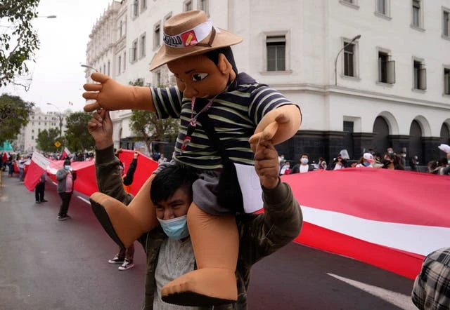 Leftist teacher inches toward victory in disputed Peru vote