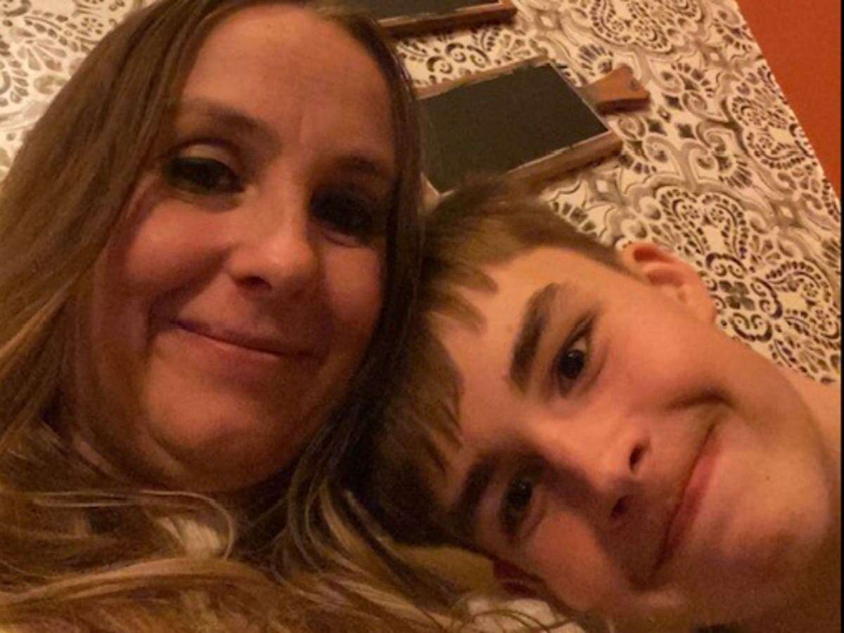 Mum relives moment son died in her arms after mistaken identity murder