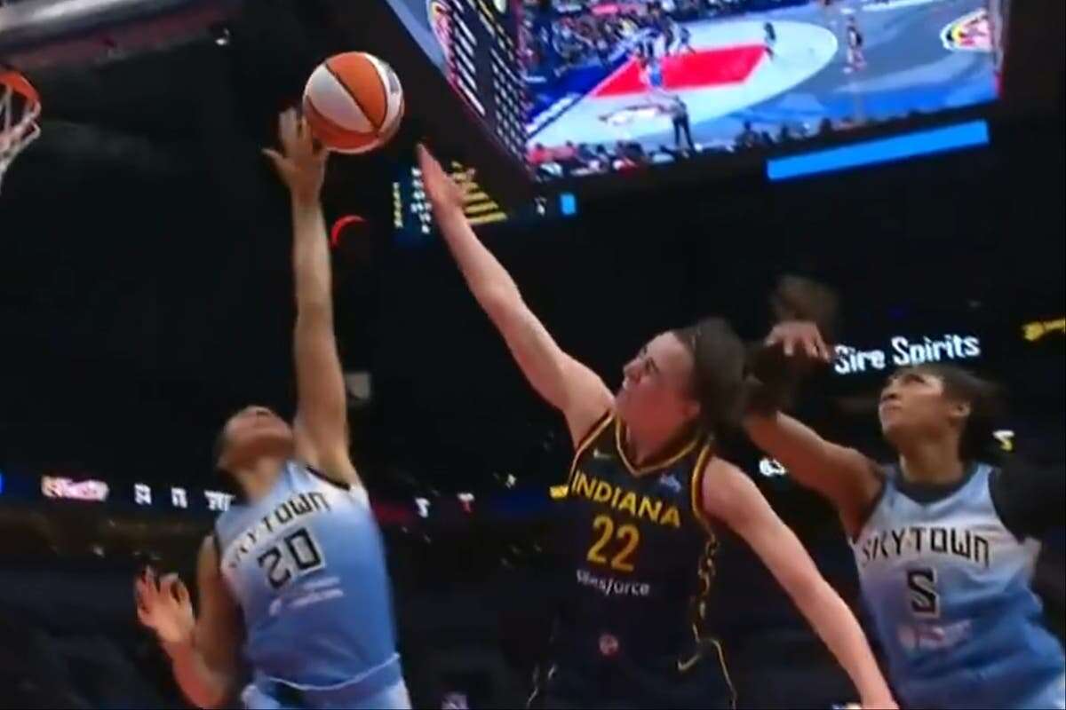 Caitlin Clark whacked on the head by WNBA rival Angel Reese