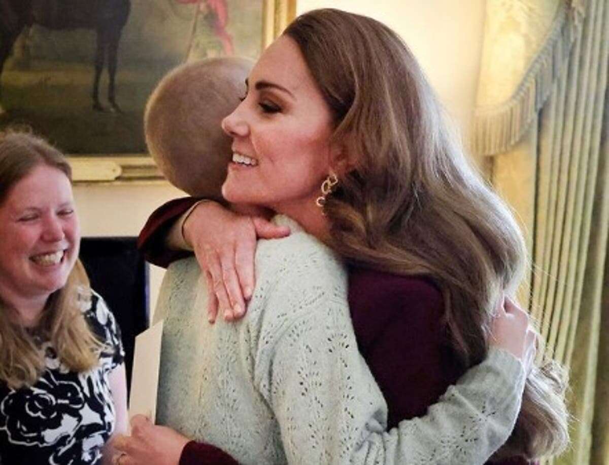 Kate embraces cancer-stricken teenager in return to royal duties