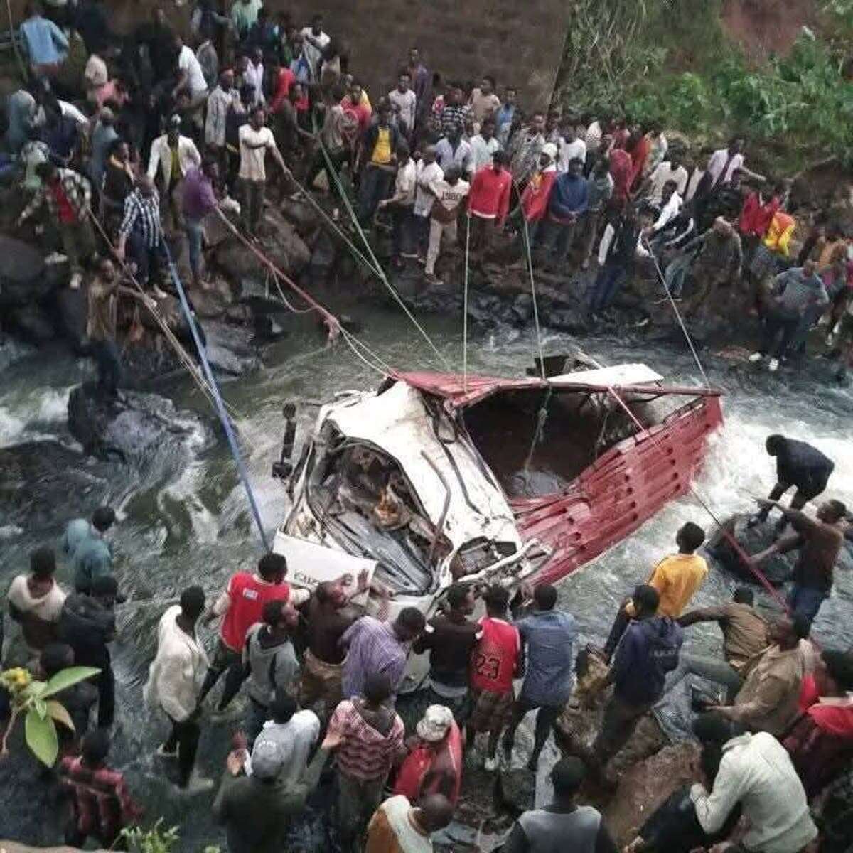 At least 71 killed as truck with wedding party plunges into river