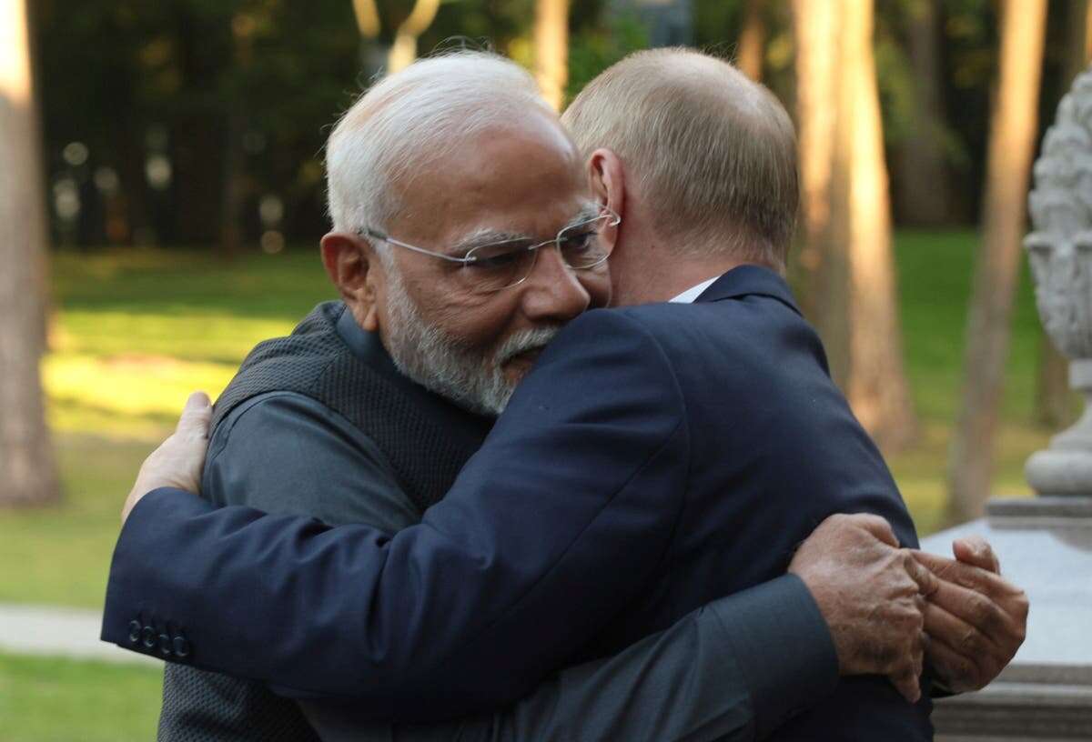 Modi under fire for hugging ‘mass murderer’ Putin during Moscow summit