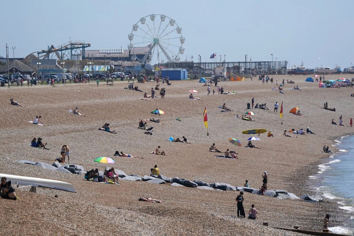 Man dies on packed beach on hottest day of the year