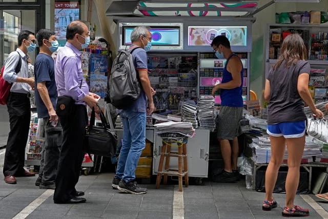 Apple Daily prints more copies as Hong Kongers buy in bulk after raid