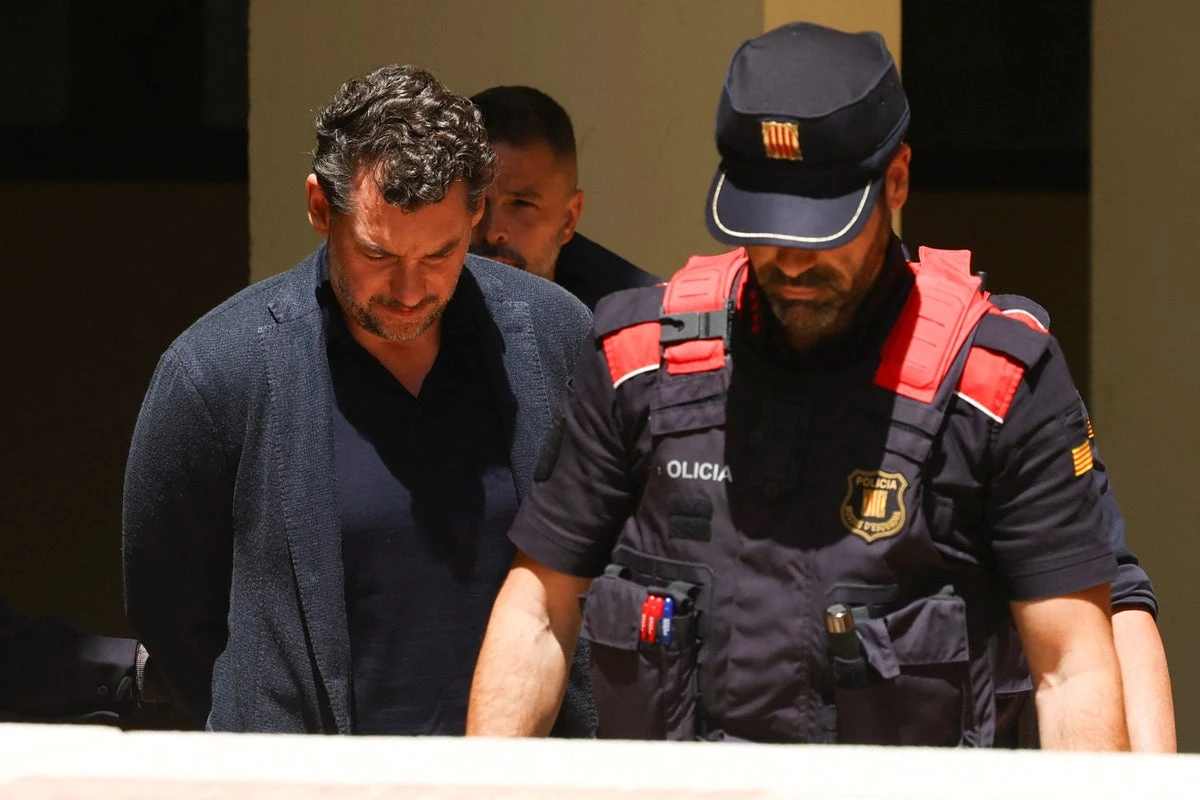 Mango heir steps down after being named suspect in father’s death