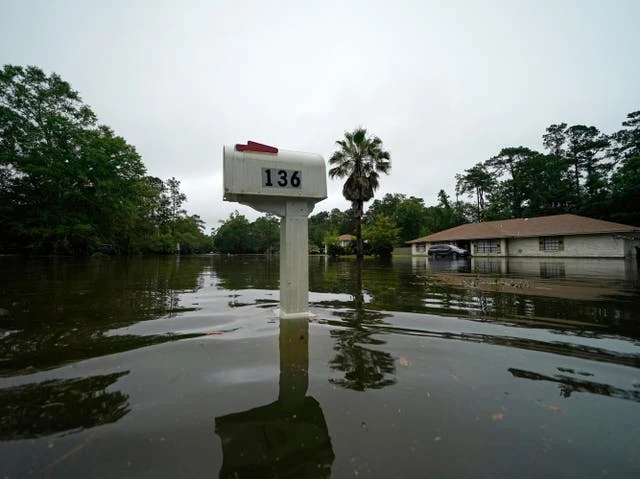 Neighbourhoods swamped by tropical storm Claudette on Gulf Coast