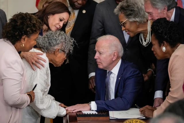 Biden gets down on one knee to greet ‘grandmother of Juneteenth’