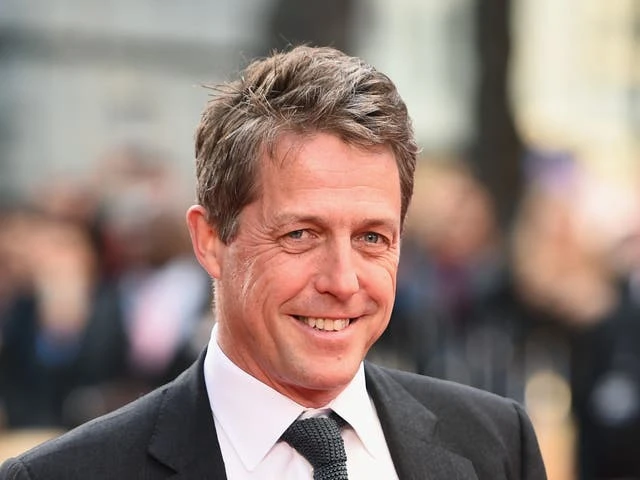 Hugh Grant says he’s ‘relieved’ he no longer plays the ‘charming lead’