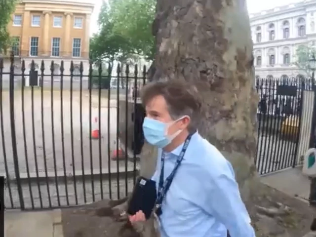 Second man arrested after BBC journalist chased by protesters