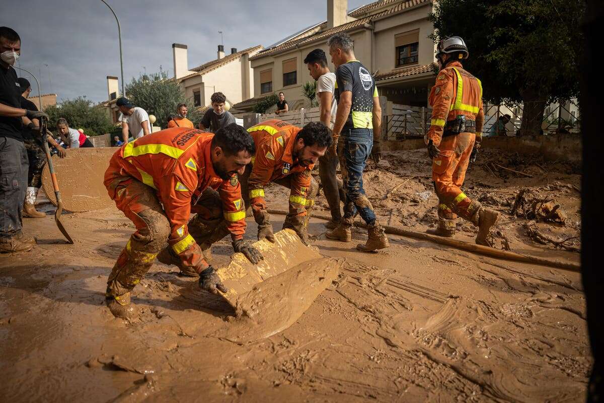 Spain deploys 15,000 police and troops to help flood relief