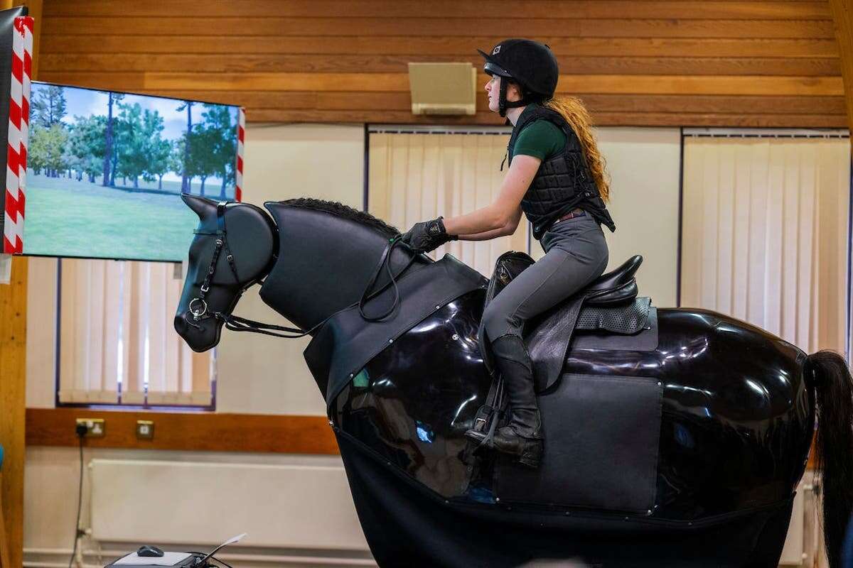 Students saddle up to learn how to ride on ‘RoboCob’